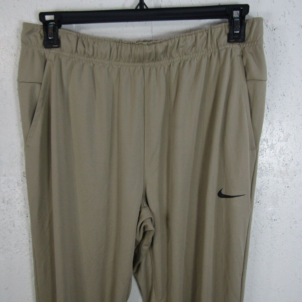 Nike Dri-FIT Men's Activewear Pants Khaki Tan Elastic Waist Zipper Ankle Size L